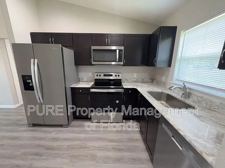 6577 SW 140th Place Rd #2 — Photo 35