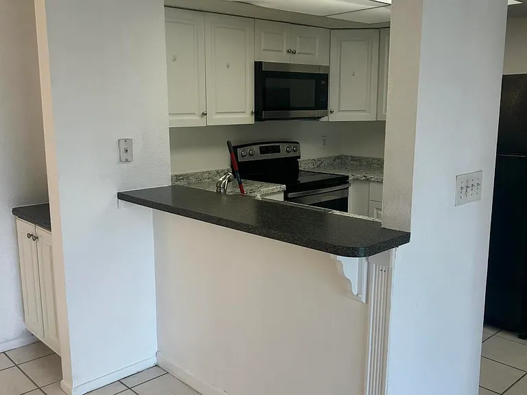 1537 SE Royal Green Cir #E201 — Photo 12