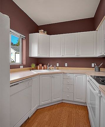 Designer white kitchen with breakfast nook
