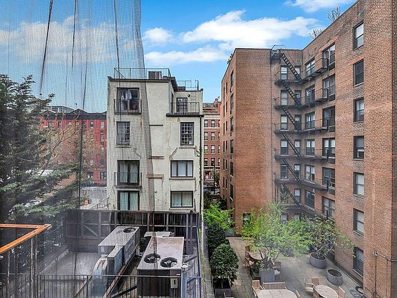 5th image of 223 W 10th St APT 2C