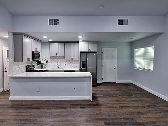 Looking from the living room to the kitchen.