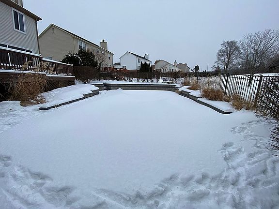 Fenced in pool area 