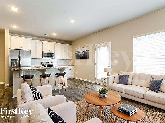 3rd image of 10732 Rivergate Dr NW