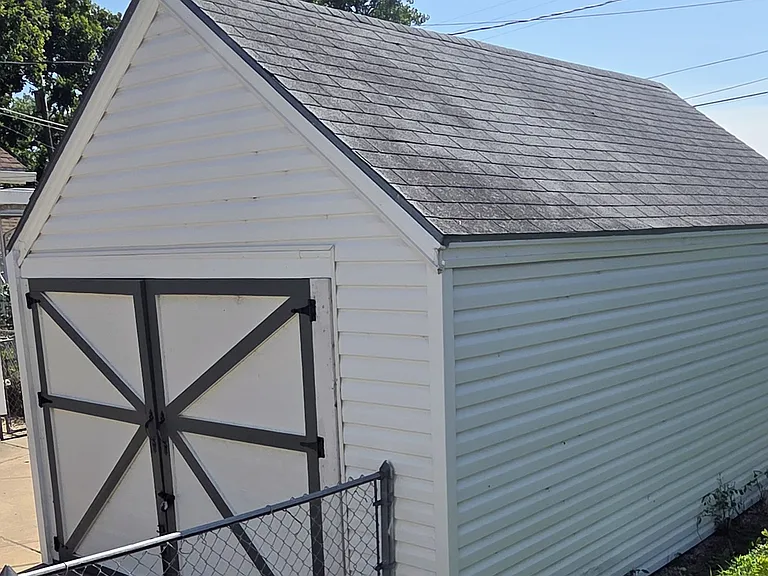 Detached garage with carriage doors