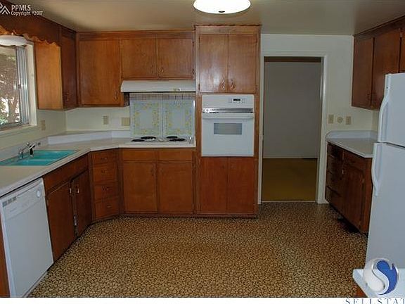 Good size kitchen with in wall oven, range, dishwasher, refrigerator and new disposal. Lots of cabin