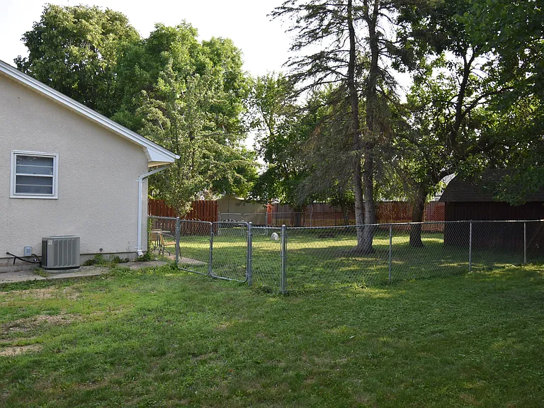 Private fenced backyard.