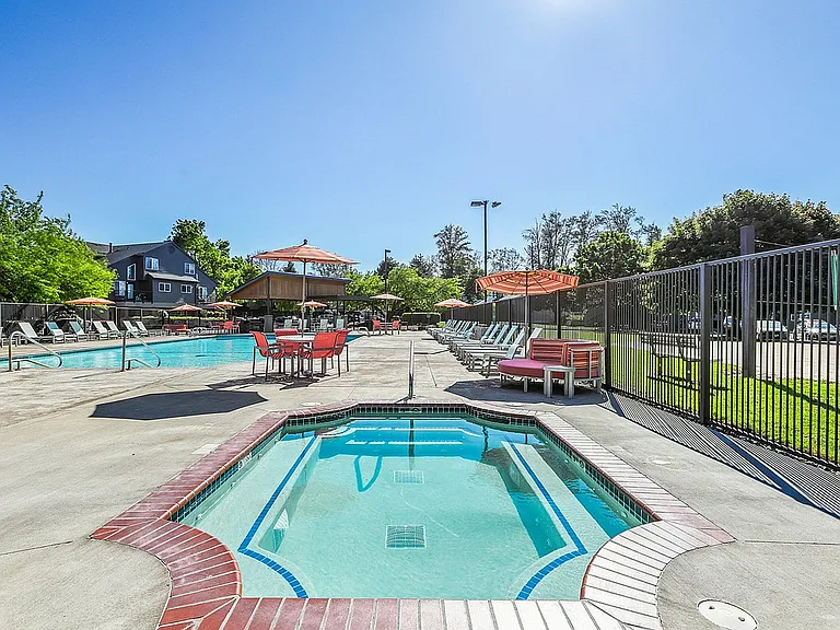 Experience relaxation at its finest in this luxurious outdoor pool area.