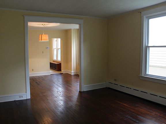 living room, dining room and view into kitchen