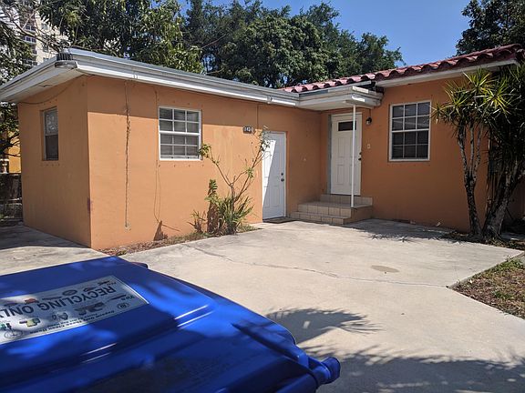 Parking entrance,property is the one with steps