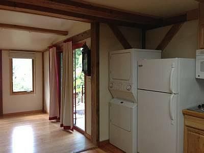 Washer/dryer and edge of kitchenette
