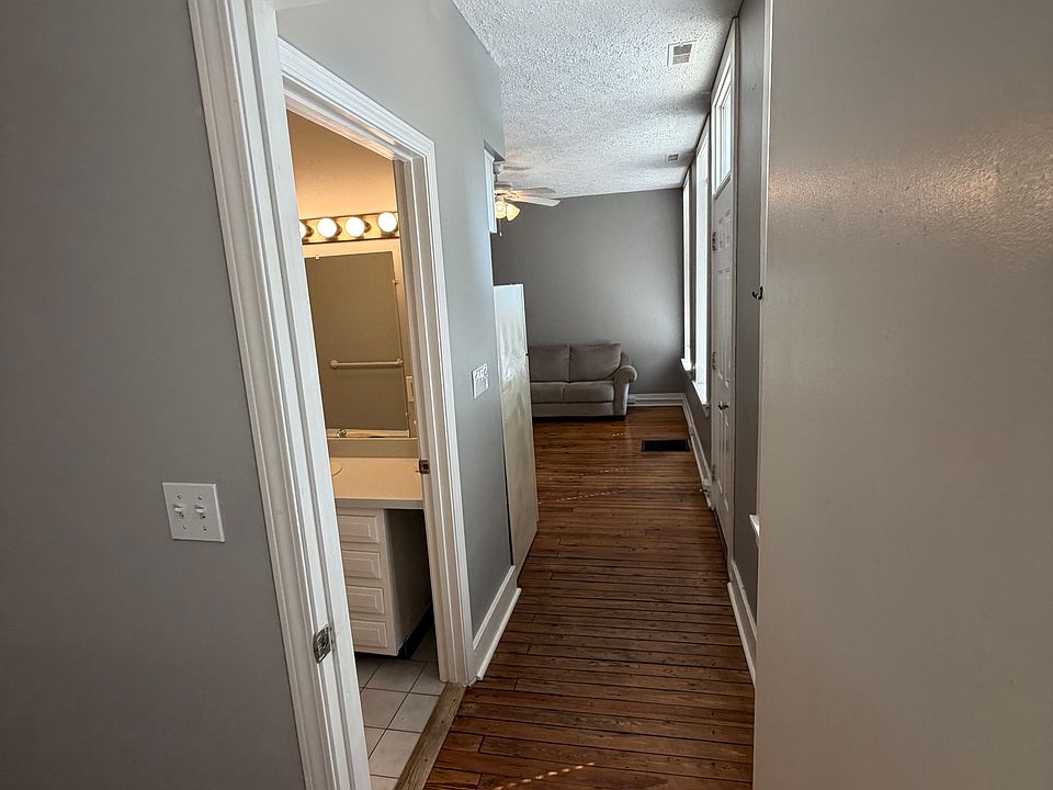 Looking from bedroom toward living room/ kitchen combo