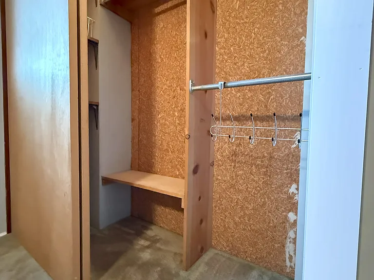 Closet with plenty of space to hang clothing.