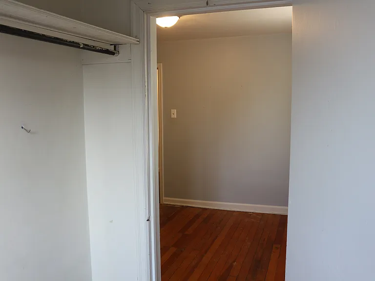 In walk-in closet, towards 2nd bedroom