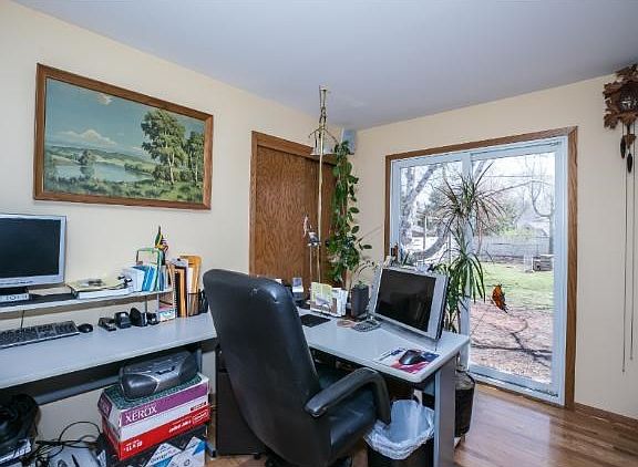 Walkout to the large fully fenced backyard.  Sellers are currently using this area for an office area but again the possibilities for this main level are endless!