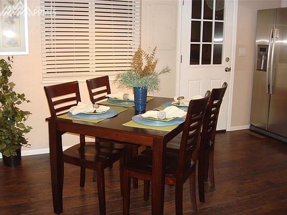 Kitchen has direct access to the Back yard