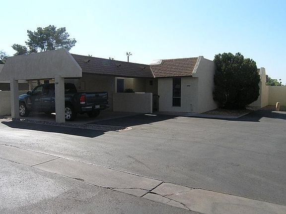 Two-car Carport and Front of House