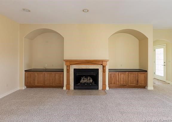 Gas Log Fireplace & Built in Cabinets