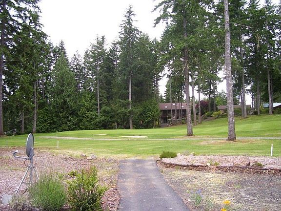 Looking up 5th fairway with paved golf cart access from your yard