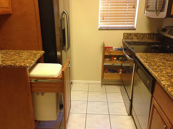 Pull out trash and spice rack