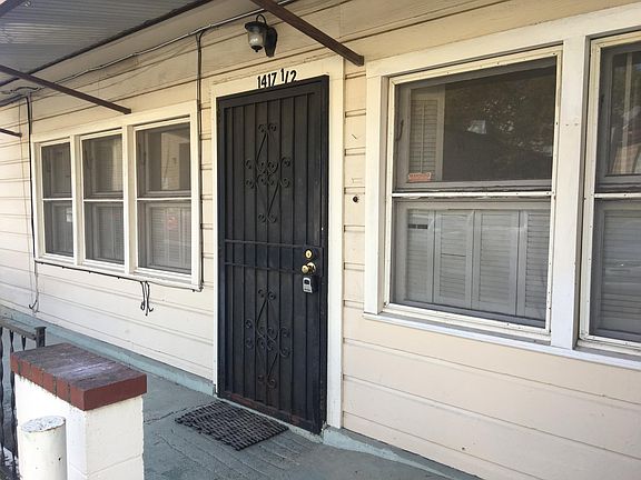Front door that leads to living room