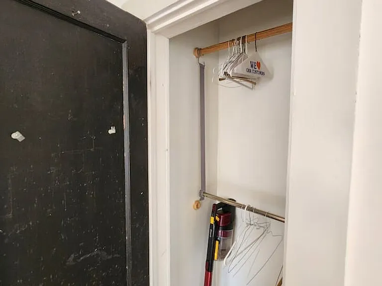 E 11th 1/2 St — Photo 19