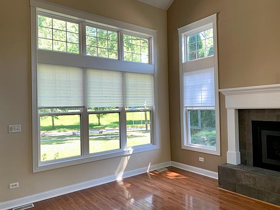 Living room with views of green space
