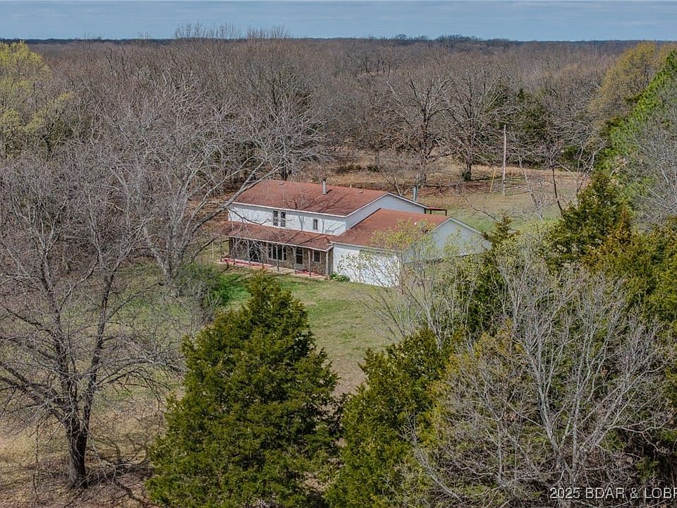 Aerial View Backside of Home and Garage