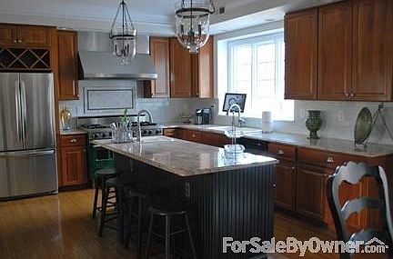 Updated Kitchen with Viking Stove
						:
						Fully updated eat-in kitchen leads to a cozy sun-porch for peaceful evenings.