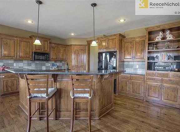 Granite counters, breakfast bar, lots of built ins