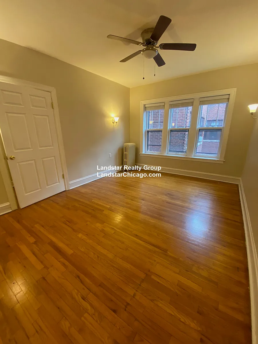 Building Photo - 1370 W Estes Ave #1N