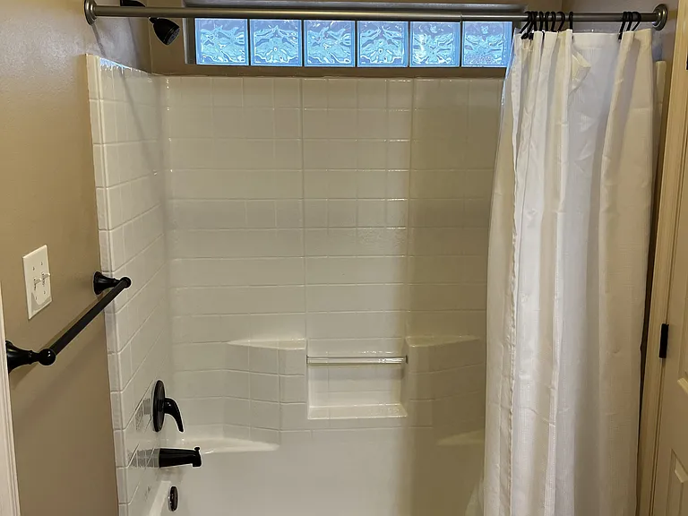 master bath, large walk in closet behind shower