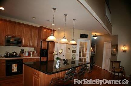 Gourmet Kitchen with extra large island
						:
						upgraded cabinets, & lighting & extra storage, extra large granite island