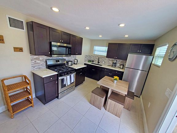 Ample Kitchen, stocked with all appliances and every utensil you need for cooking
