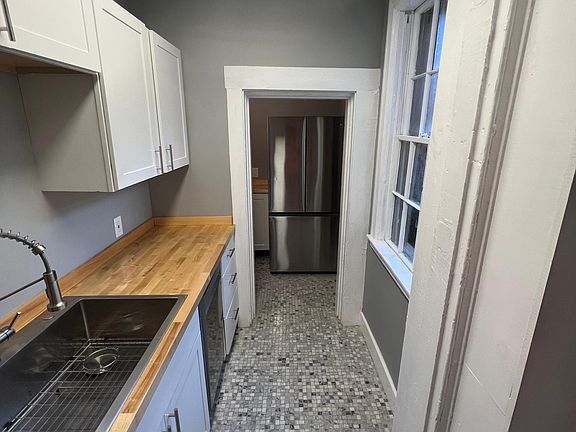 Kitchen, looking into pantry
