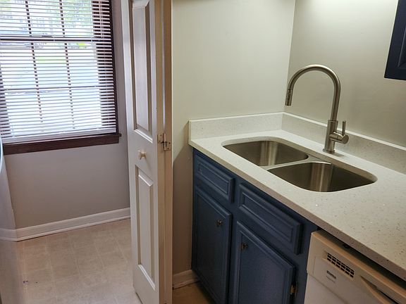 Kitchen leads to laundry room