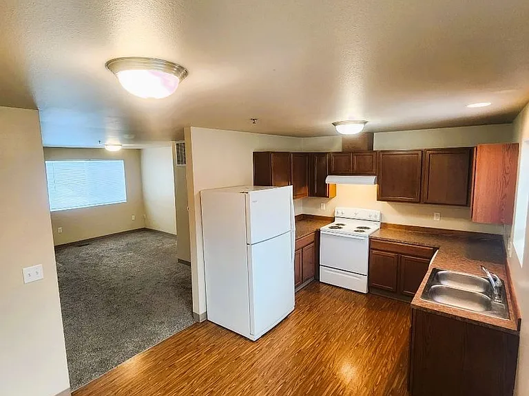 Village Apartments — Photo 6