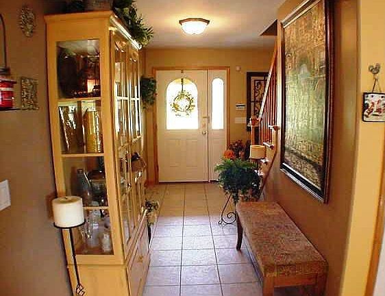 Downstairs Hallway with tile floor