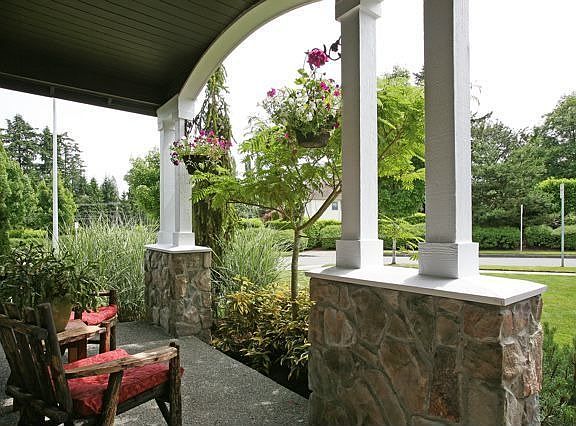 Front porch faces south and east.