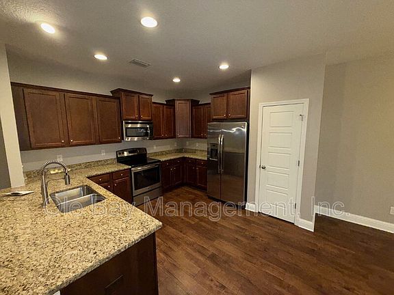 4th image of 10013 Summer Woods Cir N