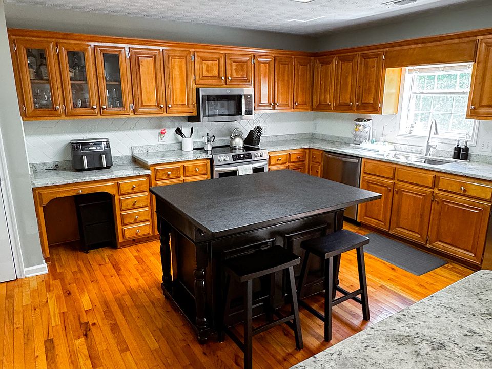 Kitchen is upgraded with new stainless steel appliances.