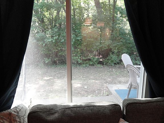 Living Room View of Patio & Woods