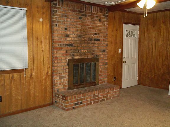Family Room has Brick Frpl.