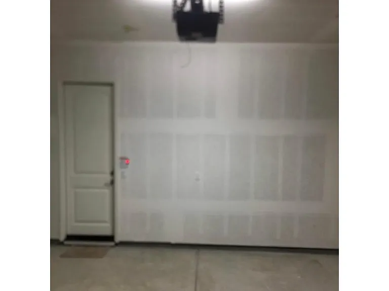 Garage with water heater tankless