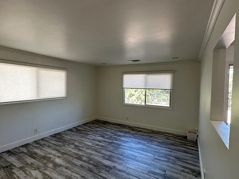 Front room / Den - with new window treatments.