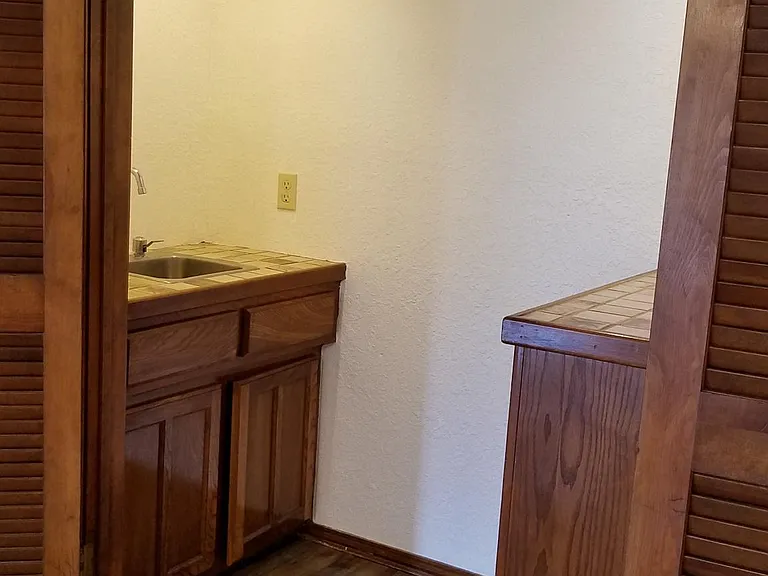 Nice Wet Bar with Storage and Large Wine Rack!