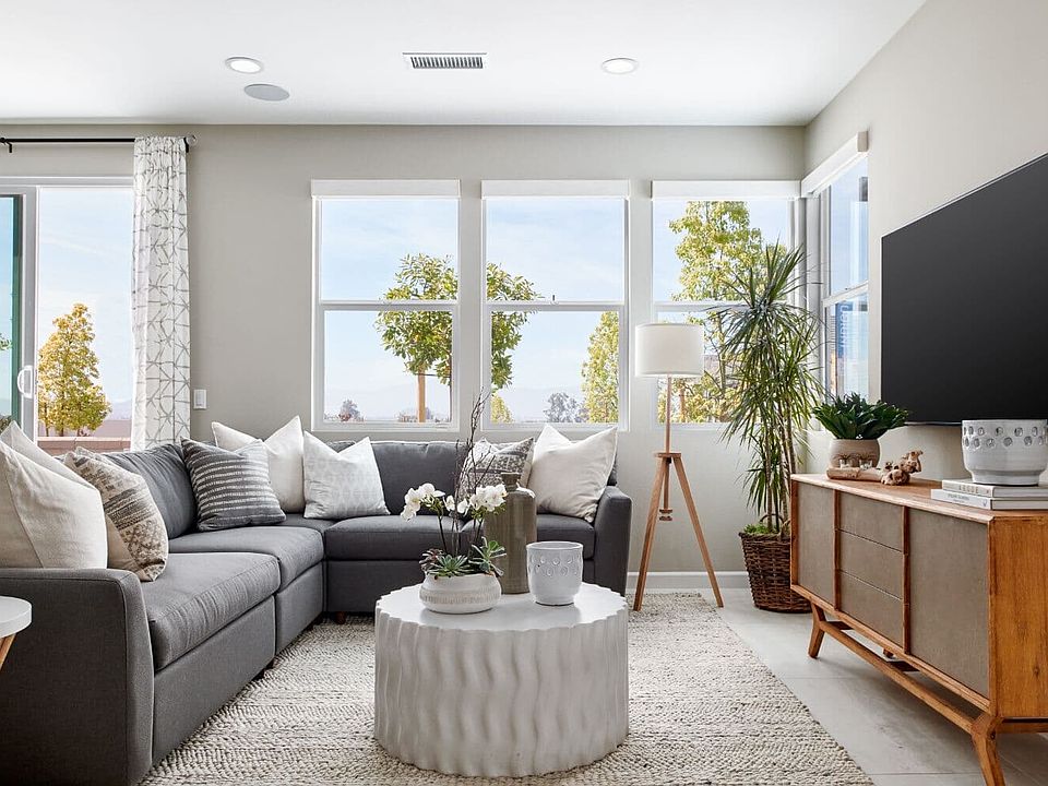 Living Room with wall mounted tv at Residence 3 at Indigo at Canvas Park
