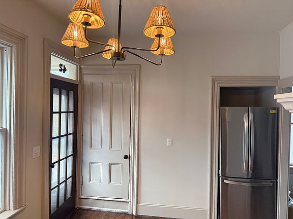 Private rear entrance leads into kitchen