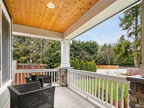 Marvelous kitchen with granite counters, stainless appliances, large island and dining nook, all centrally located in this lovely home looking out the the spacious back yard!