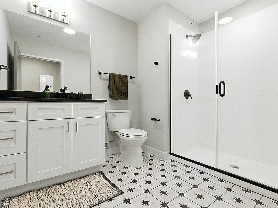 Spa-inspired bathrooms with modern finishes