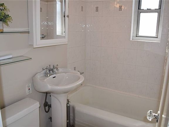 4th image of 192-07 37th Ave Unit 198